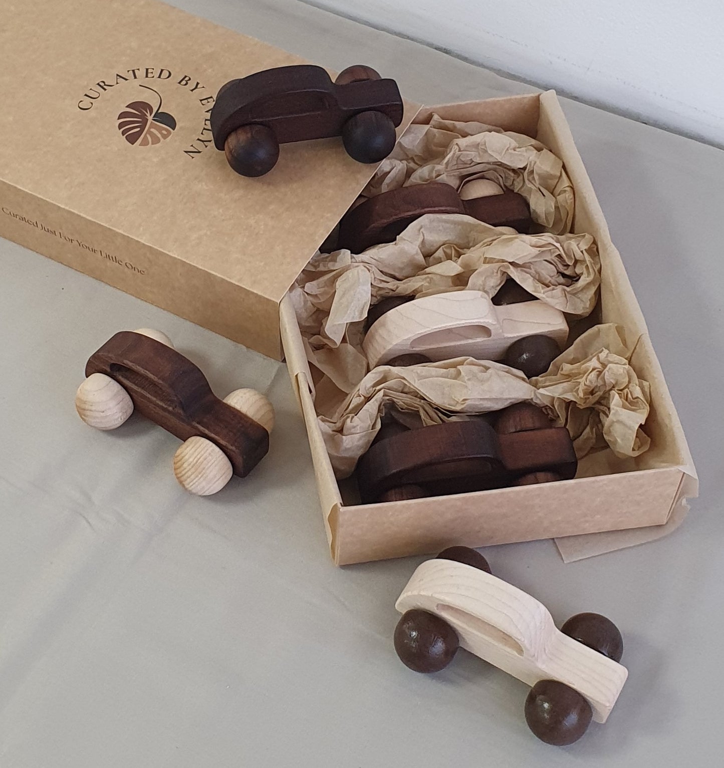 Set of three wooden cars